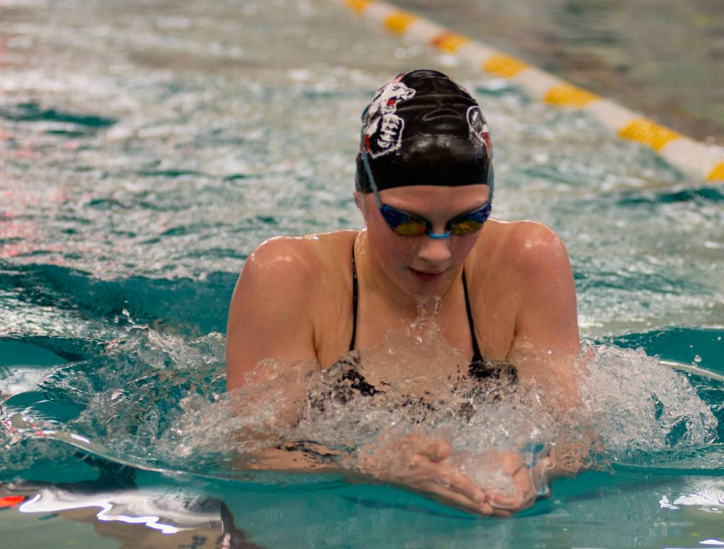 Thunder Mountain High School freshman Lily Francis swims to victory in the 100 breast at last weekends Region V Championships in Sitka. (James Poulson/Daily Sitka Sentinel)