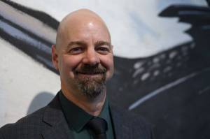 Derek Bos of Colorado smiles for a photo Sept. 28 outside of City Hall during a visit to Juneau as a finalist for chief of the Juneau Police Department. He is scheduled to start the job on Feb. 1. (Clarise Larson / Juneau Empire File)