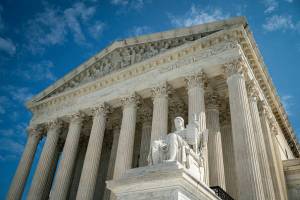 The Guardian or Authority of Law, created by sculptor James Earle Fraser, rests on the side of the U.S. Supreme Court on Sept. 28, 2020, in Washington, D.C. (Photo by Al Drago/Getty Images)