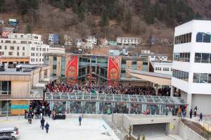 Hundreds of people visit Sealaskas Heritage Square in downtown Juneau for an April 22 ceremony celebrating the raising of 12 totem poles along Juneaus waterfront. (Mark Sabbatini / Juneau Empire File)