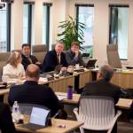 Alaska Permanent Fund Corp. board members, staff and advisors meet Oct. 30 at the corporations headquarters in Juneau to discuss a proposal to raise the funds rate of return by making riskier investments. The idea stalled when advisors suggested the strategy and timing are ill-advised. (Mark Sabbatini / Juneau Empire File).