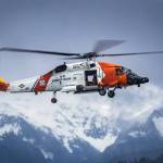 A U.S. Coast Guard Air Station Sitka helicopter hovers over Sitka Sound during routine hoist training on April 25. (Lt. Cmdr. Wryan Webb/Coast Guard)