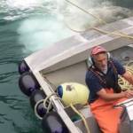 Greg Bowen on the back deck on the crab hold of the fishing vessel Trinity, captained by Nick Nelson and owned by Norval Nelson and Barbara Cadiente-Nelson. The family, who worked with Bowen for 25 years, described him as a highly skilled skiff man, setting the seine net and keeping the seiner off the bottom, off of rocks, and from rolling over when filled with salmon. (Photo courtesy of Barbara Cadiente-Nelson.)