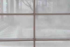 A snow-obscured view from a City and Borough of Juneau office accompanies a Facebook post Monday explaining municipal offices and facilities in downtown and Douglas are being closed for the day due to a blizzard expected to continue until 6 a.m. Tuesday. (Screenshot from City and Borough of Juneau video)