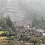 Debris from a massive landslide on Monday night extends into the sea at mile 11 on Zimovia Highway in Wrangell. Three people were killed and three more people are missing as of 5:15 p.m. Tuesday by the landslide that impacted three single-family homes, according to officials. (U.S. Coast Guard)