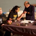 Jack Scholz, left, Tristan Cameron, center, and Dilip Ratnam discuss cultural upbringings in a rehearsal scene of A Nice Indian Boy at Perseverance Theatre on Tuesday night. The production is scheduled for the theaters main stage from Dec. 1-17, with video on demand available Dec. 13-Jan. 22. (Mark Sabbatini / Juneau Empire)