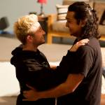 Jack Scholz, left, and Tristan Cameron reconcile in a rehearsal scene of A Nice Indian Boy at Perseverance Theatre on Tuesday night. (Mark Sabbatini / Juneau Empire)