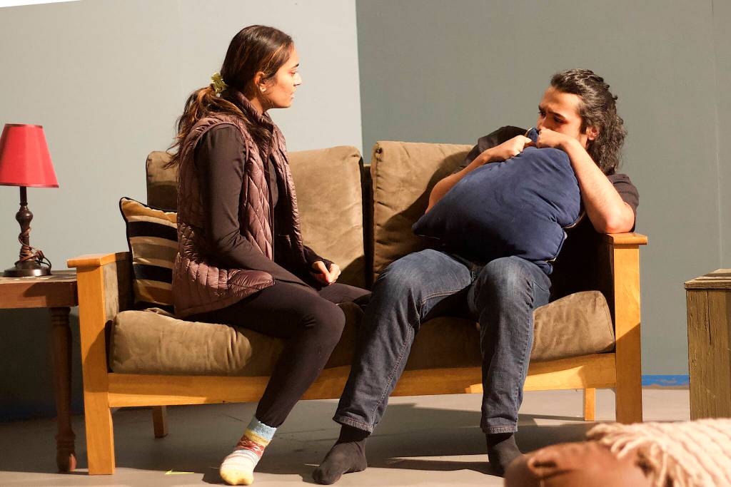 Aditi Sanghvi, left, confronts Tristan Cameron about relationship issues during a rehearsal scene Tuesday night for Perseverance Theatres upcoming production of A Nice Indian Boy. (Mark Sabbatini / Juneau Empire)