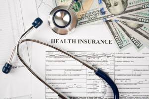 The Alaska Division of Insurance of some health care providers disagree about the impact of a state regulation setting minimum payments for out-of-network providers. Provider groups sued the state this week. (Photo by Valeriya/Getty Images Plus)