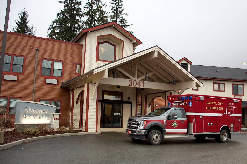 An emergency rescue vehicle parks in front of the Riverview Senior Living center at midday Monday after resident Nathan Bishop, 58, was discovered in the attic about 40 hours after he was reported missing. (Mark Sabbatini / Juneau Empire)