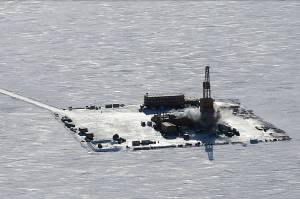 A ConocoPhillips oil rig operating during winter on Alaskas North Slope is featured on the cover of the U.S. Bureau of Land Managements report recommending approval of the Willow oil project. (U.S. Bureau of Land Management)