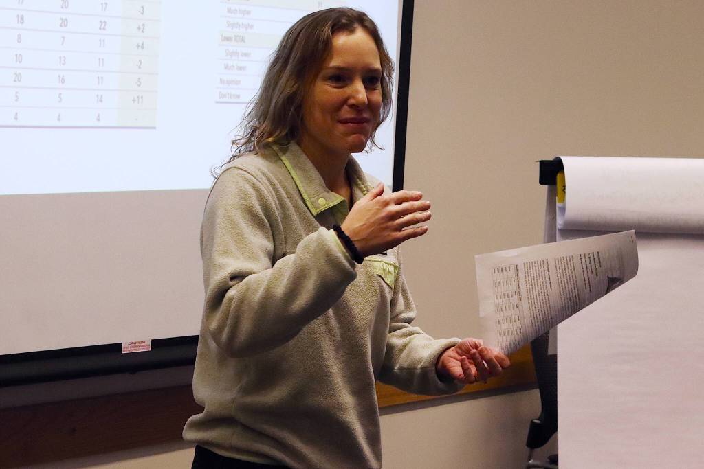 Alexandra Pierce, tourism manager for the City and Borough of Juneau, presents results of annual community and visitor surveys about cruise ship tourism to local leaders during the Assemblys annual retreat Saturday at Juneau International Airport. (Mark Sabbatini / Juneau Empire)