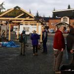 Ron Ekis (wearing red) and Dakota Brown order from Devils Hideaway at the new Vintage Food Truck Park as Marty McKeown, owner of the property, shows seating facilities still under construction to other local media members on Wednesday. (Mark Sabbatini / Juneau Empire)