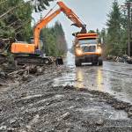 Work crews continue removing hundreds of truckloads of debris from Zimovia Highway since the Nov. 20 landslide in Wrangell. (Photo courtesy of the Alaska Department of Transportation and Public Facilities)