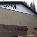 Graffiti and damage to an upper part of the Pipeline Skate Park observed at midday Thursday. (Mark Sabbatini / Juneau Empire)