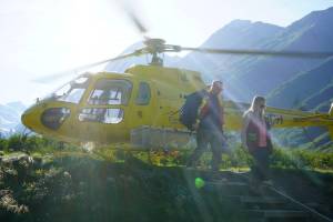 Constantine president Peter Mercer descends from a helicopter after a tour of drilling sites in August. Mercer said drilling work will be similar in the next two or three years, as the company starts to transition to more economic, environmental,. and engineering analysis that will result in a full plan for how to access the ore, which the company is shooting to release in 2026. (Lex Treinen / Chilkat Valley News)