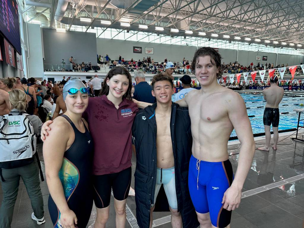 Colony High School senior Jasmine Anderson, Juneau-Douglas High School: Yadaa.at Kalé junior Emma Fellman, Service High School senior Preston Kwon and Thunder Mountain High School senior PJ Foy at the USA Swimming 2023 Speedo Winter Junior Championships in Westmont, Illinois. (Courtesy photo)