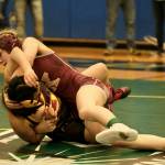Ketchikan sophomore Summer Boling puts Mt. Edgecumbe freshman Andrea Westdahl on her back during their girls 120-pound opening round match of the 2023 Region V Wrestling Championships on Friday at Thunder Mountain High School. Boling won by fall. (Klas Stolpe / For the Juneau Empire)