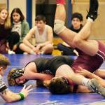 Thunder Mountain High School junior Sage Schultz pins Ketchikan senior Alexander Gilley in their 135-pound semifinal match of the 2023 Region V Wrestling Championships on Friday at TMHS. (Klas Stolpe / For the Juneau Empire)