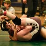 Thunder Mountain senior Liam Hart uses a cradle to pin Ketchikan High School junior Easton Yoder in the 189-pound Division I championship match of the 2023 ASAA Region V wrestling tournament, Saturday, at Thunder Mountain High School. (Klas Stolpe/ For the Juneau Empire)