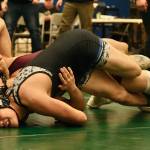 Thunder Mountain High School junior Hayden Aube attempts to pin Ketchikan High School sophomore Cayden Harney in the 145-pound Division I championship match of the 2023 ASAA Region V wrestling tournament Saturday at TMHS. Aube won by 16-6 major decision. (Klas Stolpe/ For the Juneau Empire)