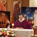 Humberto Aristizabal, the Hispanic ministry pastor at the Cathedral of Our Lady of Guadalupe in Anchorage, presides over a Feast Day of Our Lady of Guadalupe Mass at St. Paul Catholic Church on Sunday. Another Mass observing the Mexican Catholic holiday is scheduled at 6 p.m. Tuesday, Dec. 12, the official date of the celebration. (Mark Sabbatini / Juneau Empire)