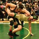 Craig senior Bryant Holloway takes down Haines sophomore James Stickler in the 189-pound Division II championship match of the 2023 ASAA Region V wrestling tournament Saturday at Thunder Mountain High School. Holloway won by technical fall 15-0. (Klas Stolpe/ For the Juneau Empire)