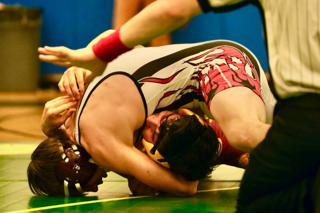 Wrangell senior Keegan Hanson pins Mt. Edgecumbe senior Atigun Pensley in the 152-pound Division II championship match of the 2023 ASAA Region V wrestling tournament Saturday at Thunder Mountain High School. (Klas Stolpe/ For the Juneau Empire)