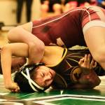 Ketchikan senior Julia Biagi works to pin Mt. Edgecumbe senior Makenna Beans in the 126-pound girls championship match of the 2023 ASAA Region V wrestling tournament Saturday at Thunder Mountain High School. Biagi won by pin. (Klas Stolpe/ For the Juneau Empire)