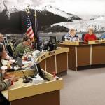 Lisa Daugherty (left), owner of Juneau Composts, explains her concerns about a proposed municipal composting facility during a Juneau Assembly meeting Monday night. (Mark Sabbatini / Juneau Empire)