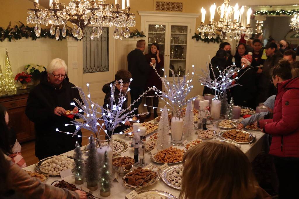 A crowd of early arrivals fill the Governors Residence during the annual Holiday Open House on Tuesday. While the event was scheduled to start at 3 p.m., people were let in early due to heavy rain and strong winds outside. (Mark Sabbatini / Juneau Empire)