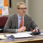 Juneau School District Superintendent Frank Hauser tells the Board of Education on Tuesday night he is asking state transportation officials to meet with district leaders to next month to discuss safety improvements on Back Loop Road following a collision last Thursday between a vehicle and three people walking to Mendenhall River Community School. (Mark Sabbatini / Juneau Empire)