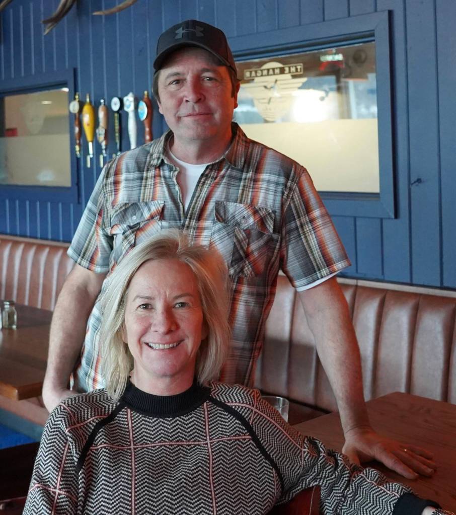 Reecia Wilson and Rob Sanford co-own Mechants Wharf and their popular aviation-themed restaurant Hangar on the Wharf. (Courtesy Merchants Wharf)