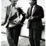Humorist Will Rogers and pilot Wiley Post enjoy a relaxed moment together. (Courtesy Oklahoma Historical Society)