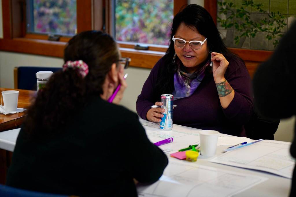 Skweit Jessie Morgan, a Business Basics for Artists participant, shares her business plan ideas with peers to workshop. (Photo by Shaelene Grace Moler)