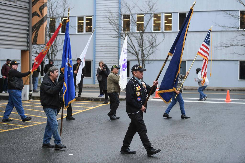 Southeast Alaska Native Veterans Color Guard presents the colors during the Veterans Day Ceremony at the SE Alaska Native Veterans Park on Monday, Nov. 11, 2019. (Michael Penn / Juneau Empire file photo)