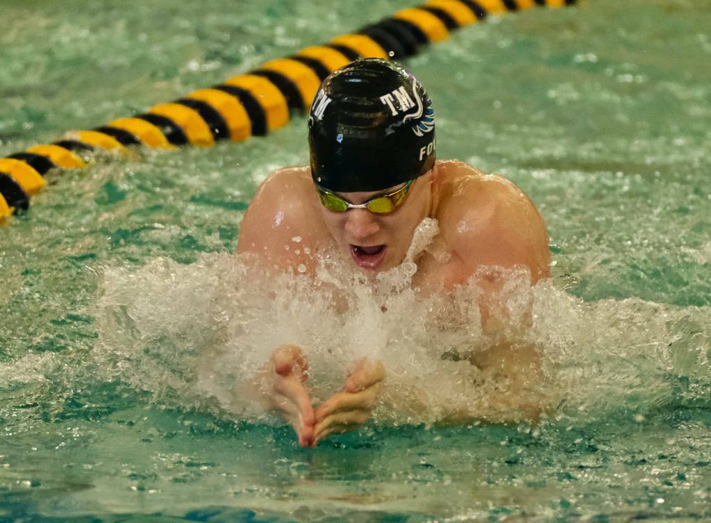 Thunder Mountain senior PJ Foy swims his state record-winning 100 breaststroke on Saturday, Nov. 4, in the ASAA State Swim & Dive Championships at the Dimond Park Aquatic Center. (Klas Stolpe / Juneau Empire file photo)