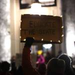 A protester holds a sign advocating for an increase in the states Base Student Allocation during a rally at the steps of the Alaska State Capitol on Monday, Jan. 23. (Clarise Larson / Juneau Empire file photo)