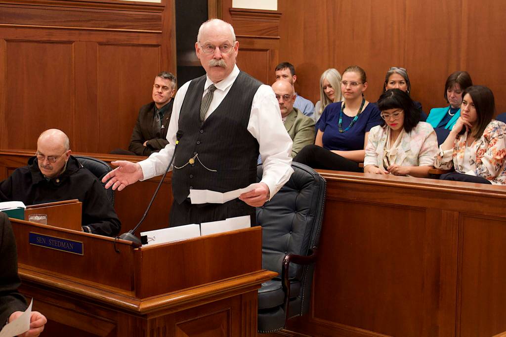 State Sen. Bert Stedman, a Sitka Republican who co-chairs the Senate Finance Committee, details a list of 24 projects costing about $34 million that were added to the state budget during negotiations with House members Thursday, May 18. Behind Stedman in the audience section is nearly the entire 16-member House minority caucus, which voted in favor of the budget along with 10 members of the Republican-led House majority. (Mark Sabbatini / Juneau Empire file photo)