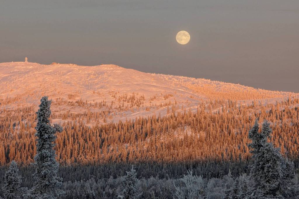 John Eichelberger of Fairbanks took this photo of the full moon on Dec. 26 north of Fairbanks. At the time he took this photo  solar noon in Fairbanks or about 1 p.m. local time  the full moon appeared due north of him. (Photo by John Eichelberger)