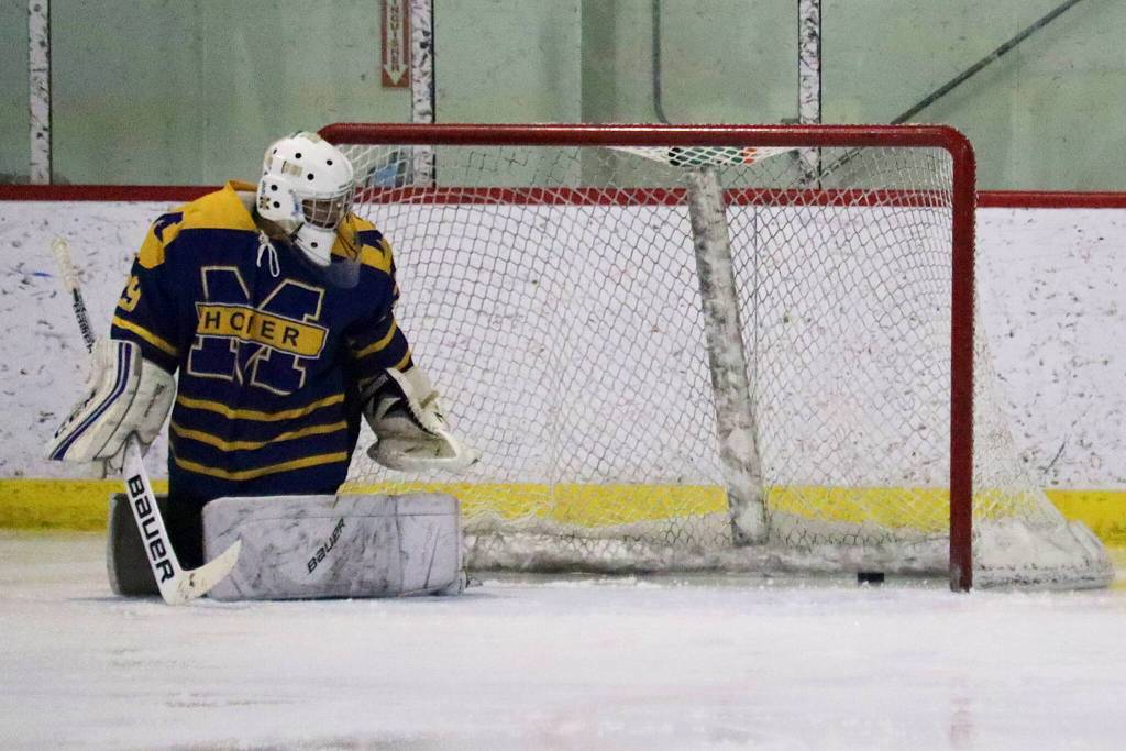 The goalie for Homer High School sees a puck get past him during a 13-0 loss to Juneau-Douglas High School: Yadaa.at Kalé on Saturday at Treadwell Arena. JDHS also defeated Homer 16-0 on Friday night. (Mark Sabbatini / Juneau Empire)