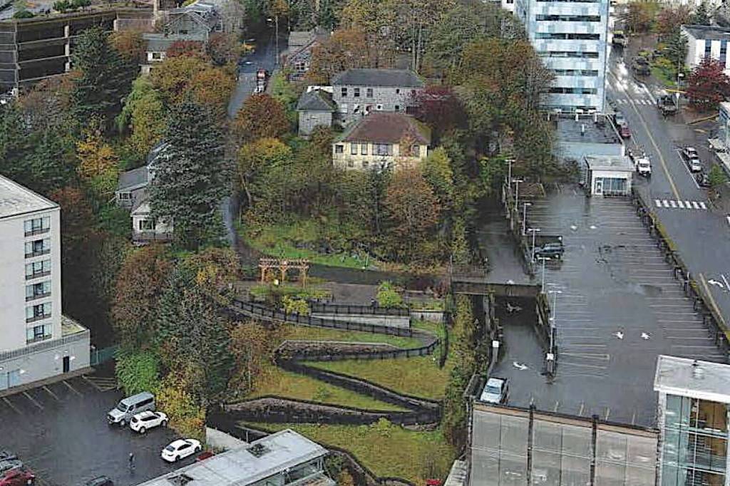The Edward Webster House (top center in grey), named for a former owner who located his Juneau and Douglas Telephone Co. there for decades beginning in 1915, is the oldest house still in use in Juneau. (Photo courtesy of the City and Borough of Juneau)
