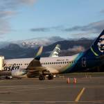 Alaska Airlines planes park at the gates at Juneau International Airport in July of 2022. (Mark Sabbatini / Juneau Empire file photo)