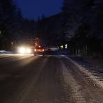 A sign with newly installed reflectors warns drivers on Back Loop Road about pedestrians crossing near the entrance of Mendenhall River Community School on Wednesday morning. A woman and two kids were hit by a vehicle on the road Dec. 7, prompting local school district officials to seek safety improvements from the state. Additional short- and long-term safety measures are still being discussed. (Mark Sabbatini / Juneau Empire)