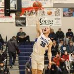 Thomas Baxter scores on a breakaway dunk for Thunder Mountain High School during Saturdays game against Sitka High School at TMHS. (Mark Sabbatini / Juneau Empire)