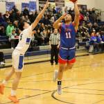 Sitka High Schools Jayden Costello goes up for a shot under the basket during Saturdays game at Thunder Mountain High School. (Mark Sabbatini / Juneau Empire)