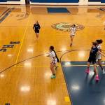 The Thunder Mountain High School girls basketball team runs a fast break against Bartlett High School on Friday in Anchorage. The Falcons, who played their first nine games on the road, open at home on Thursday against South Anchorage High School. (Screenshot from Thunder Mountain High School video)