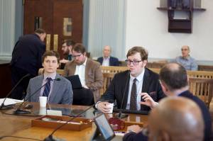Legislative fiscal analysts Alexei Painter, right, and Conor Bell explain the states financial outlook during a presentation to the Senate Finance Committee on March 24, 2023. (Mark Sabbatini / Juneau Empire)