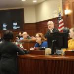 Senate President Gary Stevens, a Kodiak Republican, confers with other senators and legislative staff moments before gaveling in the start of this years legislative session at the Alaska State Capitol on Tuesday. (Mark Sabbatini / Juneau Empire)