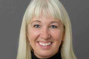 Acting Alaska Department of Labor and Workforce Development Commissioner Cathy Muñoz is seen in an undated headshot photo provided by the department. (Contributed photo)